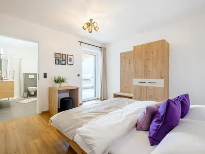 Ein Bett oder Betten in einem Zimmer der Unterkunft Tauern-Blick