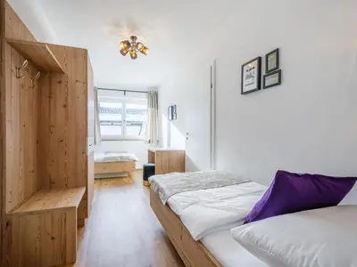 Ein Bett oder Betten in einem Zimmer der Unterkunft Roßbrand und Tauern-Blick