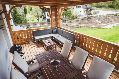 Ein Sitzbereich in der Unterkunft Ferienwohnungen Villa Salzweg
