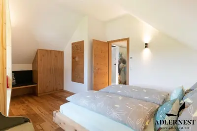 Ein Bett oder Betten in einem Zimmer der Unterkunft Adlernest