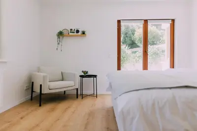 Ein Bett oder Betten in einem Zimmer der Unterkunft Bacherlhaus