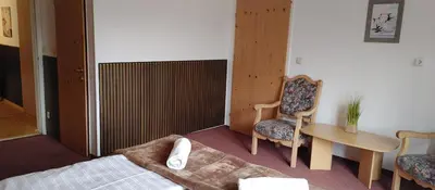 Ein Bett oder Betten in einem Zimmer der Unterkunft Apartment House Seerose self check-in