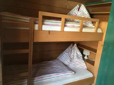 Ein Etagenbett oder Etagenbetten in einem Zimmer der Unterkunft Appartement Sonnberg
