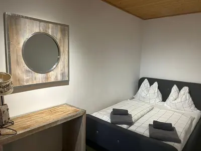 Ein Bett oder Betten in einem Zimmer der Unterkunft Alpensicht