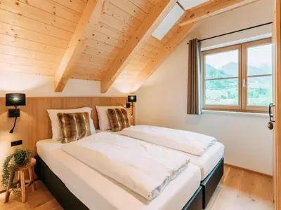 Ein Bett oder Betten in einem Zimmer der Unterkunft Chalet Norah