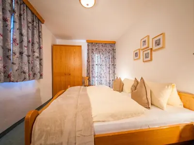 Ein Bett oder Betten in einem Zimmer der Unterkunft Pistenblick Forstau