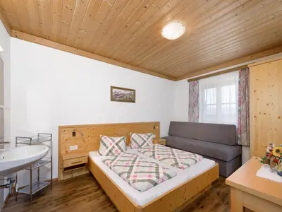 Ein Bett oder Betten in einem Zimmer der Unterkunft Haus Tanja