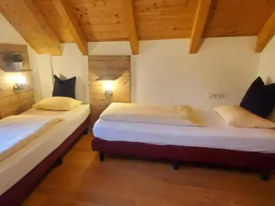 Ein Bett oder Betten in einem Zimmer der Unterkunft Mur-Chalet St Michael