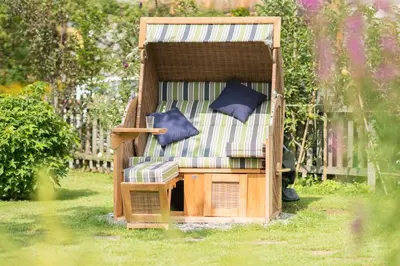Ein Garten an der Unterkunft Glück am See - Apartment mit Seezugang