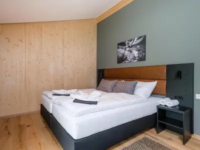 Ein Bett oder Betten in einem Zimmer der Unterkunft Aquarius Haus 7 TOP 16