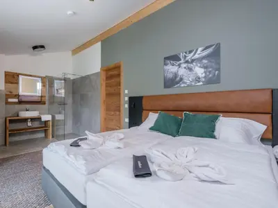 Ein Bett oder Betten in einem Zimmer der Unterkunft Aquarius Haus 7 TOP 16