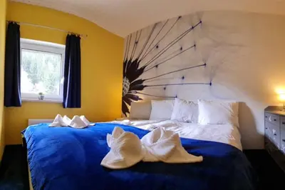 Ein Bett oder Betten in einem Zimmer der Unterkunft Murzeit Apartman