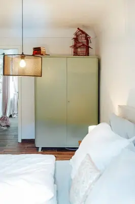 Ein Bett oder Betten in einem Zimmer der Unterkunft Apartment Aussee- Beletage Salzherrenhof- Küche, WLAN, Netflix
