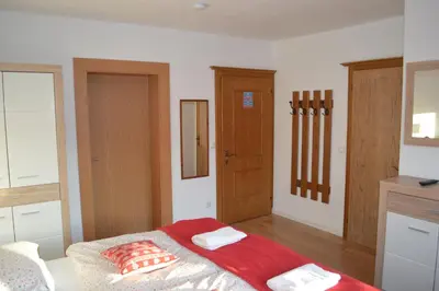 Ein Bett oder Betten in einem Zimmer der Unterkunft Haus Susanne