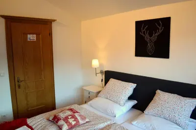 Ein Bett oder Betten in einem Zimmer der Unterkunft Haus Susanne