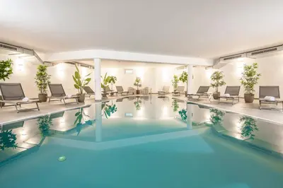 Der Swimmingpool an oder in der Nähe von AlpenParks Hotel & Apartment Alpendorf