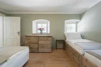 Ein Bett oder Betten in einem Zimmer der Unterkunft Braumeisterhaus Schloss Eggenberg