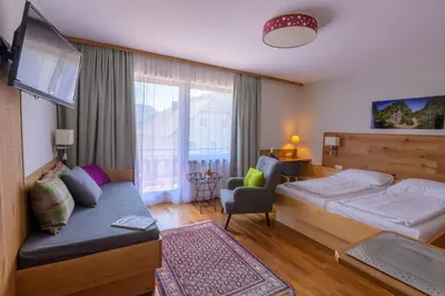 Ein Bett oder Betten in einem Zimmer der Unterkunft Landgasthof Kirchenwirt