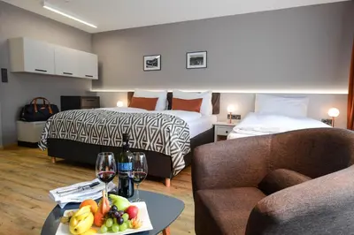 Ein Bett oder Betten in einem Zimmer der Unterkunft Hotel Alpenblick Kreischberg