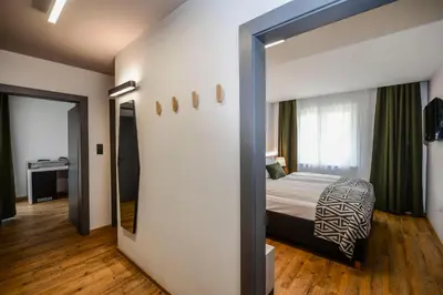 Ein Bett oder Betten in einem Zimmer der Unterkunft Hotel Alpenblick Kreischberg