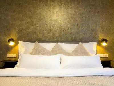 Ein Bett oder Betten in einem Zimmer der Unterkunft Bergzeit Gosau