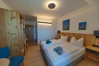 Ein Bett oder Betten in einem Zimmer der Unterkunft Haus Weyregg - Pension