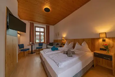Ein Bett oder Betten in einem Zimmer der Unterkunft Haus Weyregg - Pension