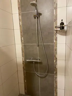 Ein Badezimmer in der Unterkunft Egglmeiers Doppelzimmer