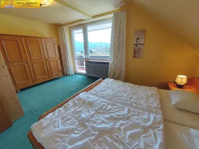 Ein Bett oder Betten in einem Zimmer der Unterkunft Apartment Alpenrock