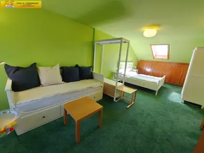 Ein Bett oder Betten in einem Zimmer der Unterkunft Apartment Alpenrock