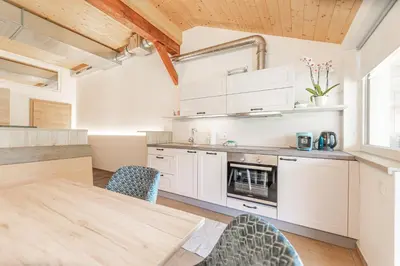 Küche/Küchenzeile in der Unterkunft Chalets am Badesee Lassing