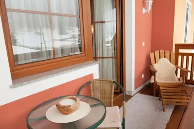 Ein Sitzbereich in der Unterkunft Appartements Höller