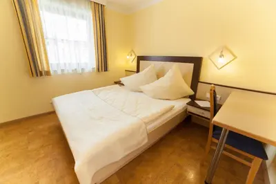 Ein Bett oder Betten in einem Zimmer der Unterkunft Appartements Höller