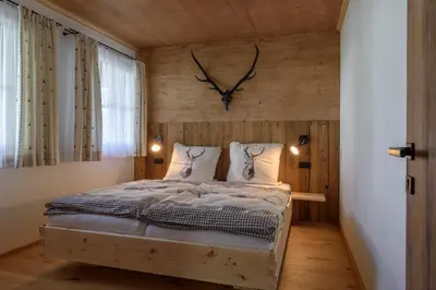 Ein Bett oder Betten in einem Zimmer der Unterkunft Chalet Seeklause