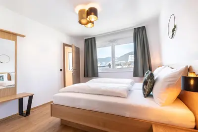 Ein Bett oder Betten in einem Zimmer der Unterkunft LISAL Appartements