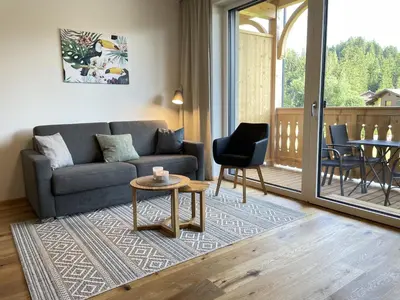 Ein Sitzbereich in der Unterkunft Grimmingblick Apartment 206 by AA Holiday Homes