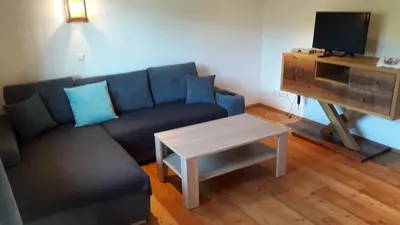 Ein Sitzbereich in der Unterkunft Ferienwohnung Appesbacher