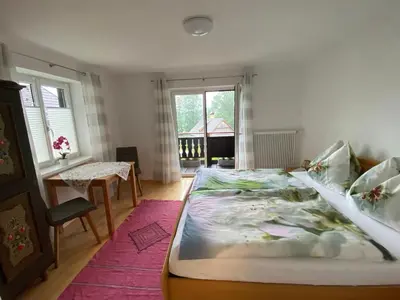 Ein Bett oder Betten in einem Zimmer der Unterkunft Ferienwohnung Laimer, Radau 37