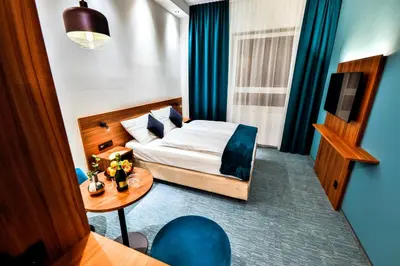 Ein Bett oder Betten in einem Zimmer der Unterkunft Hotel Das Zeit