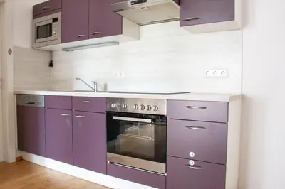Küche/Küchenzeile in der Unterkunft Royal 4 Trend by Alpenidyll Apartments