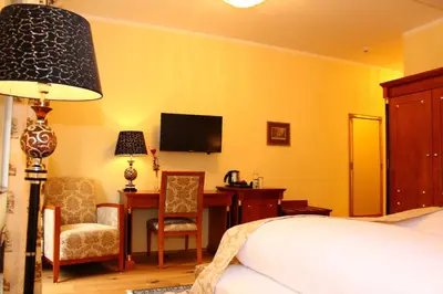 Ein Bett oder Betten in einem Zimmer der Unterkunft Seehotel Grüner Baum