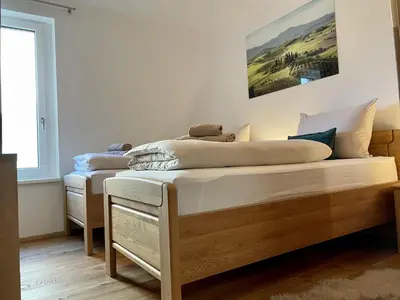 Ein Bett oder Betten in einem Zimmer der Unterkunft Panorama Lodge Mountainview 208