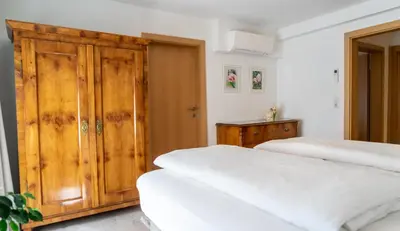 Ein Bett oder Betten in einem Zimmer der Unterkunft Modern Apartment in the City Center of Bad Ischl