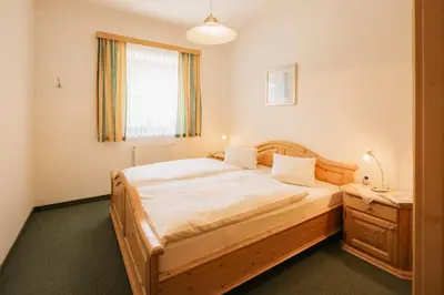 Ein Bett oder Betten in einem Zimmer der Unterkunft Appartementhaus Samson Fanningberg