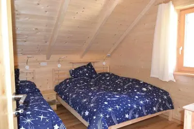 Ein Bett oder Betten in einem Zimmer der Unterkunft Talhuette App.1 Lachtal 542