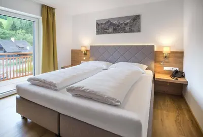 Ein Bett oder Betten in einem Zimmer der Unterkunft Appartementhaus Madlen