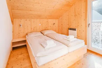 Ein Bett oder Betten in einem Zimmer der Unterkunft Chalet Prinz Murau Kreischberg