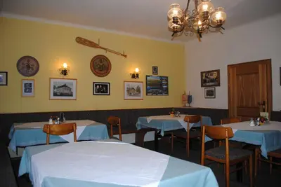 Ein Restaurant oder anderes Speiselokal in der Unterkunft Gasthof Knappenwirt