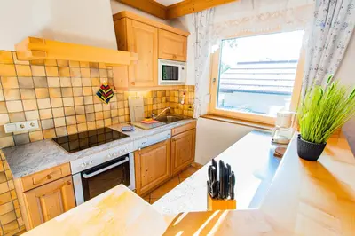 Küche/Küchenzeile in der Unterkunft Bergidyll 9 by Alpenidyll Apartments