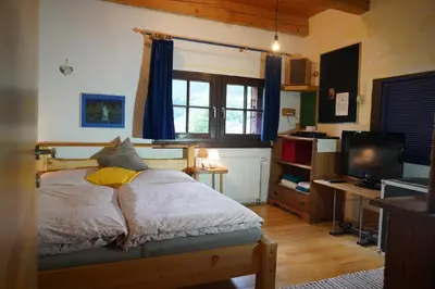 Ein Bett oder Betten in einem Zimmer der Unterkunft Wohnstudio in umgebauter Scheune